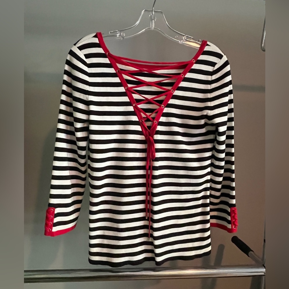 Black and white with red trim.  Tie front. Dana Buchman sweater.